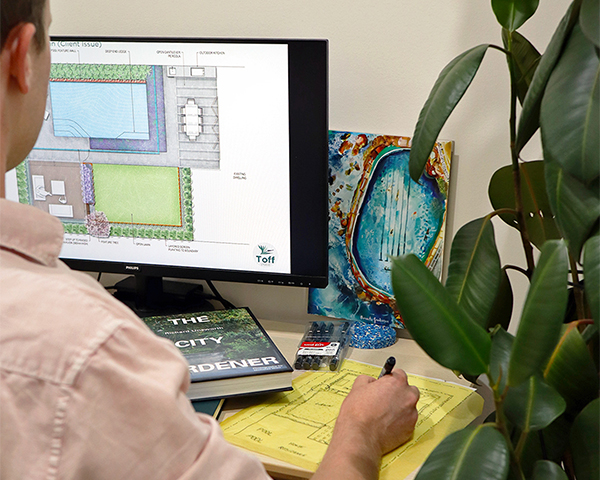 landscape architect working on plan in studio